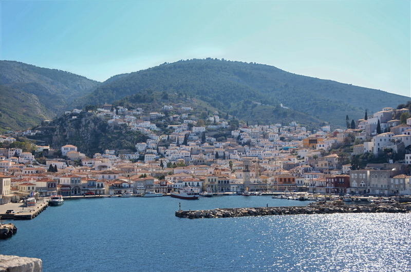25 - The picturesque port town of Hydra Island in the Saronic Gulf of Greece, featuring its signature amphitheatric stone architecture climbing the hillside